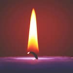 Close-up of a lit candle with a bright flame and a violet wax base.