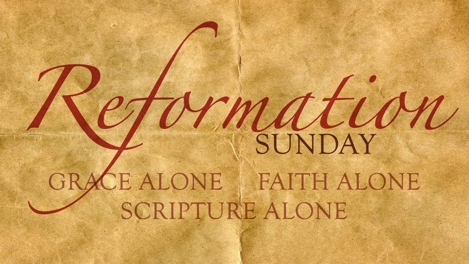 Text on aged paper reads "Reformation Sunday" with "GRACE ALONE," "FAITH ALONE," and "SCRIPTURE ALONE" below.
